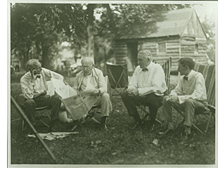 Friends Henry Ford, Thomas Edison and Harvey Firestone pictured with President Warren G. Harding on a camping trip that the four took together in Maryland with members of their families, July 23-24, 1921.