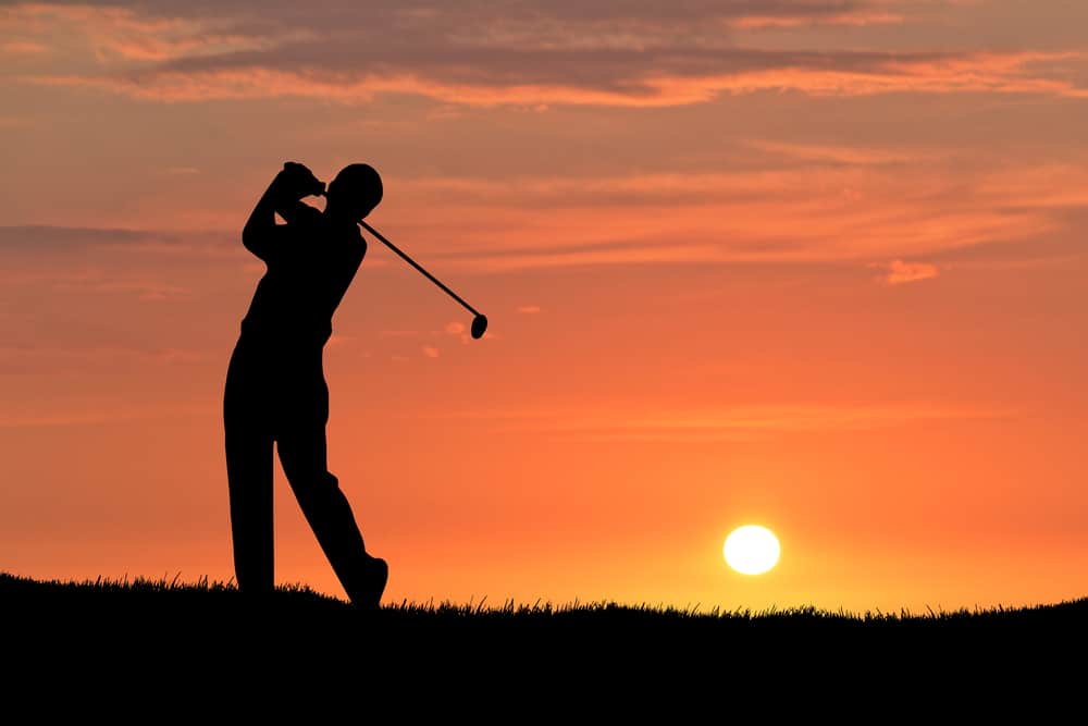 Deep Creek Golf Courses, photo of a man golfing at sunset