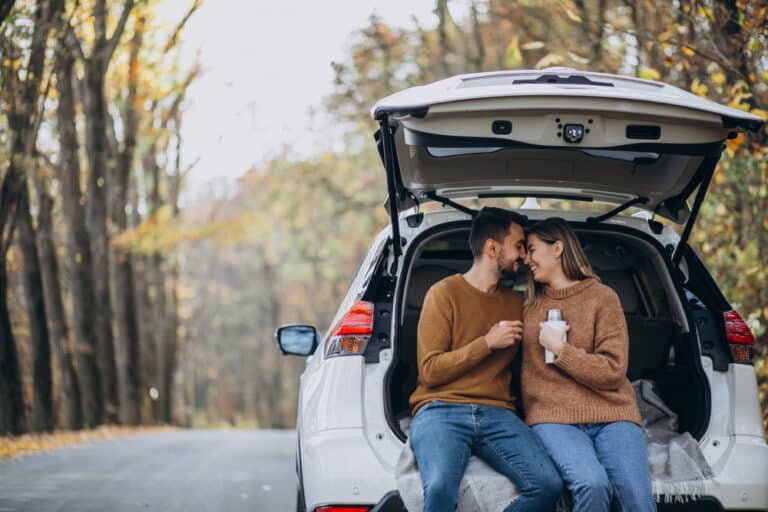 The Best Day Trip Itinerary for Scenic Drives in Maryland, photo of a couple hanging out in their car